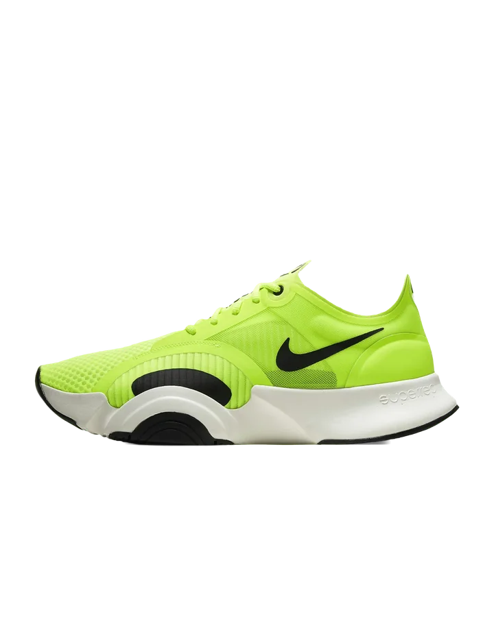 The volt-green shoe cut out by CRABOY and placed on pure white, centered in a square frame